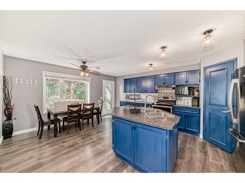 128 Somercrest Manor Sw, Calgary, AB - Indoor Photo Showing Kitchen With Double Sink