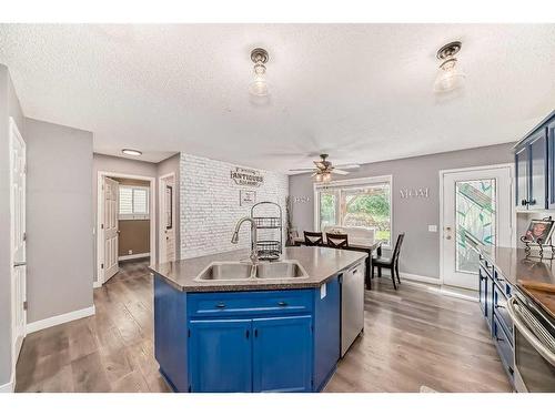 128 Somercrest Manor Sw, Calgary, AB - Indoor Photo Showing Kitchen With Double Sink