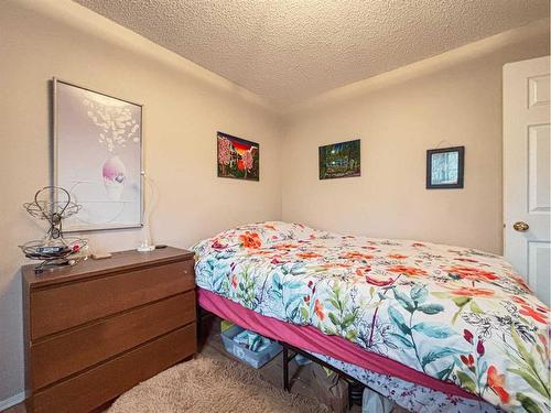 206 Harvest Creek Close Ne, Calgary, AB - Indoor Photo Showing Bedroom