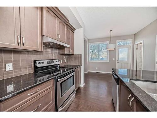 544 Panatella Walk Nw, Calgary, AB - Indoor Photo Showing Kitchen With Upgraded Kitchen