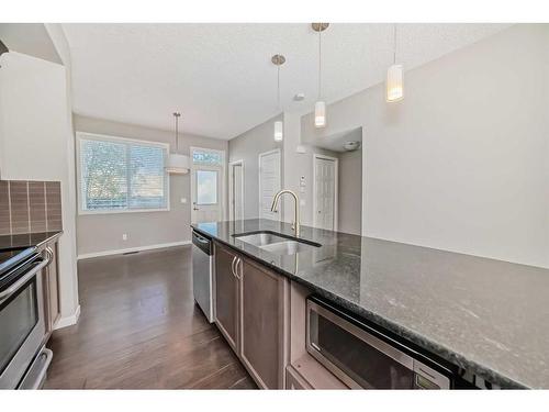 544 Panatella Walk Nw, Calgary, AB - Indoor Photo Showing Kitchen With Double Sink With Upgraded Kitchen