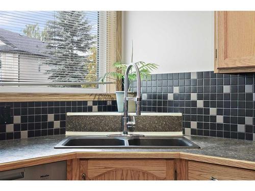 899 Somerset Drive Sw, Calgary, AB - Indoor Photo Showing Kitchen With Double Sink