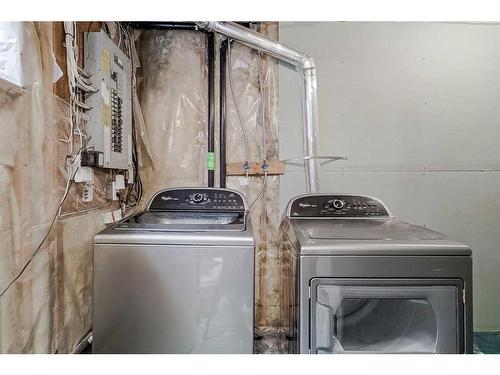 73 Applemont Place Se, Calgary, AB - Indoor Photo Showing Laundry Room