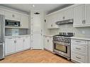 77 Signature Close Sw, Calgary, AB  - Indoor Photo Showing Kitchen With Stainless Steel Kitchen 