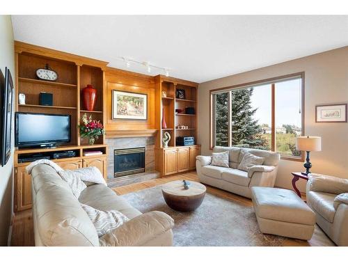 88 Citadel Green Nw, Calgary, AB - Indoor Photo Showing Living Room With Fireplace