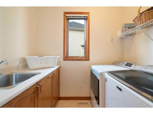 88 Citadel Green Nw, Calgary, AB - Indoor Photo Showing Laundry Room