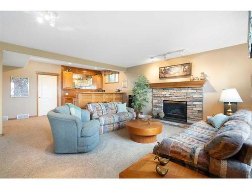 88 Citadel Green Nw, Calgary, AB - Indoor Photo Showing Living Room With Fireplace