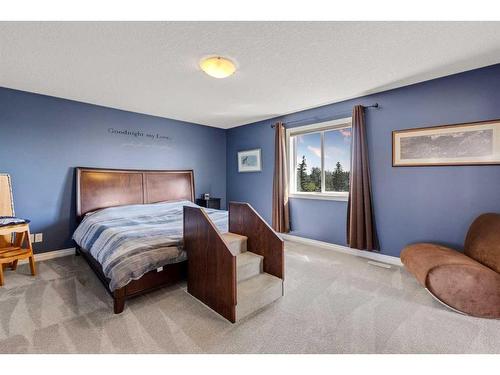 62 Crystal Green Way, Okotoks, AB - Indoor Photo Showing Bedroom