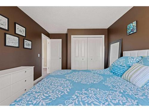 62 Crystal Green Way, Okotoks, AB - Indoor Photo Showing Bedroom