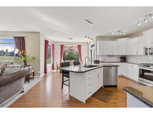 62 Crystal Green Way, Okotoks, AB - Indoor Photo Showing Kitchen With Stainless Steel Kitchen With Double Sink