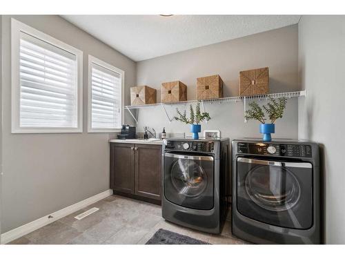 94 Auburn Springs Park Se, Calgary, AB - Indoor Photo Showing Laundry Room