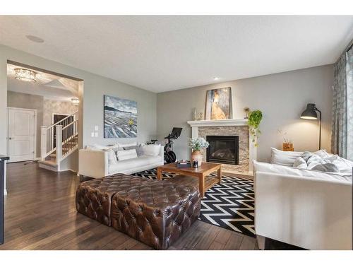 94 Auburn Springs Park Se, Calgary, AB - Indoor Photo Showing Living Room With Fireplace