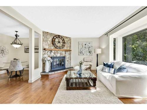 1004 Woodview Crescent Sw, Calgary, AB - Indoor Photo Showing Living Room With Fireplace