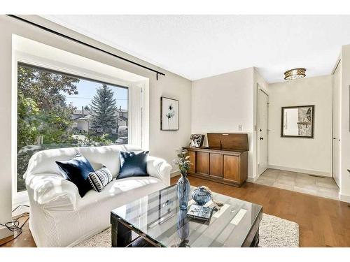 1004 Woodview Crescent Sw, Calgary, AB - Indoor Photo Showing Living Room With Fireplace