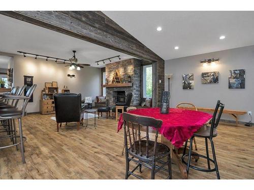 465076 Rge Rd 240, Rural Wetaskiwin No. 10, County Of, AB - Indoor Photo Showing Dining Room With Fireplace