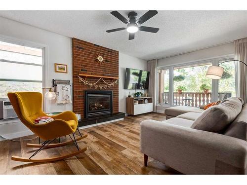 121 Sunmills Drive Se, Calgary, AB - Indoor Photo Showing Living Room With Fireplace