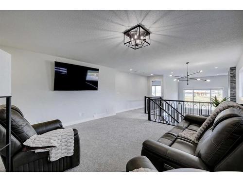 235 Precedence Hill, Cochrane, AB - Indoor Photo Showing Living Room