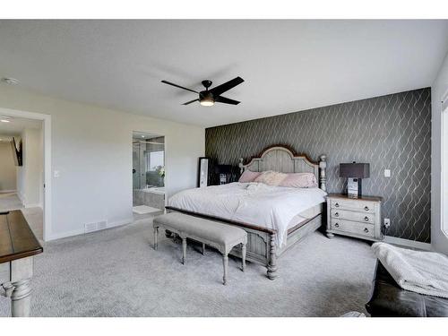 235 Precedence Hill, Cochrane, AB - Indoor Photo Showing Bedroom