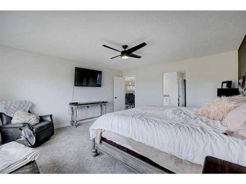 235 Precedence Hill, Cochrane, AB - Indoor Photo Showing Bedroom