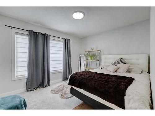 235 Precedence Hill, Cochrane, AB - Indoor Photo Showing Bedroom