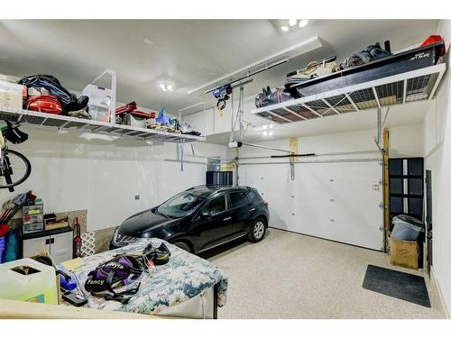 235 Precedence Hill, Cochrane, AB - Indoor Photo Showing Garage