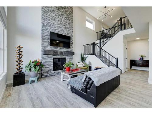 235 Precedence Hill, Cochrane, AB - Indoor With Fireplace