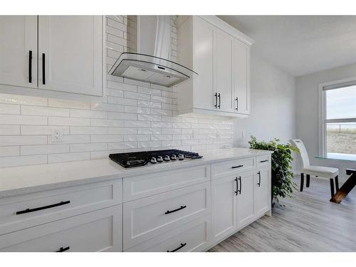 235 Precedence Hill, Cochrane, AB - Indoor Photo Showing Kitchen