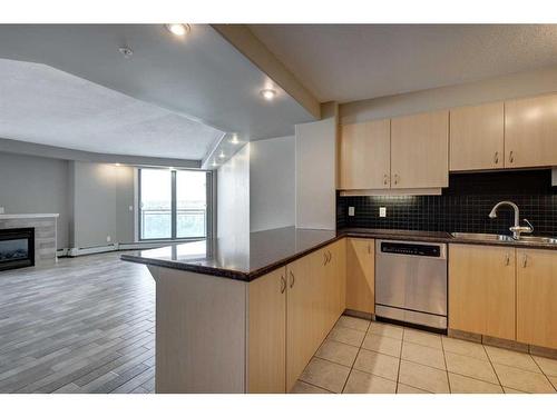 908-1121 6 Avenue Sw, Calgary, AB - Indoor Photo Showing Kitchen With Stainless Steel Kitchen