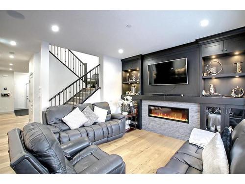 33 Savanna Grove Ne, Calgary, AB - Indoor Photo Showing Living Room With Fireplace