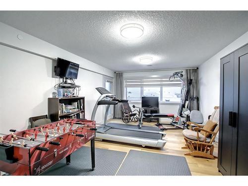 33 Savanna Grove Ne, Calgary, AB - Indoor Photo Showing Gym Room