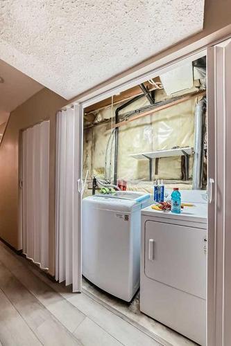 56 Country Hills Villas Nw, Calgary, AB - Indoor Photo Showing Laundry Room