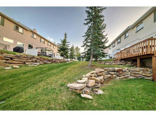 56 Country Hills Villas Nw, Calgary, AB - Outdoor With Deck Patio Veranda With Exterior