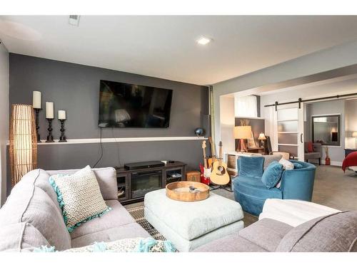 37 Lakeside Greens Close, Chestermere, AB - Indoor Photo Showing Living Room