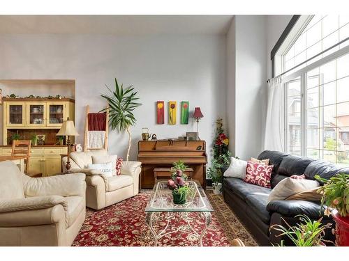 37 Lakeside Greens Close, Chestermere, AB - Indoor Photo Showing Living Room