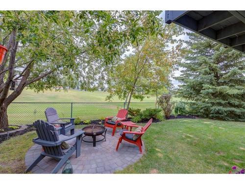 37 Lakeside Greens Close, Chestermere, AB - Outdoor With Backyard