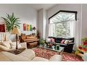 37 Lakeside Greens Close, Chestermere, AB  - Indoor Photo Showing Living Room 