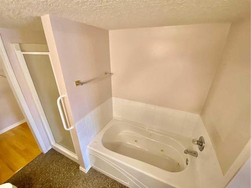 120-6868 Sierra Morena Boulevard Sw, Calgary, AB - Indoor Photo Showing Other Room