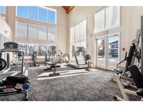 120-6868 Sierra Morena Boulevard Sw, Calgary, AB - Indoor Photo Showing Gym Room