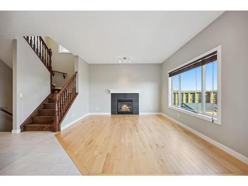 91 Panton Road Nw, Calgary, AB - Indoor Photo Showing Living Room With Fireplace