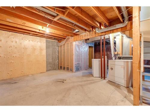 1002 Signal Hill Green Sw, Calgary, AB - Indoor Photo Showing Basement