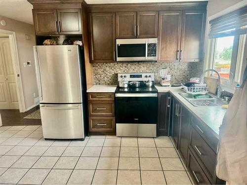 803 Whitehill Way Ne, Calgary, AB - Indoor Photo Showing Kitchen With Stainless Steel Kitchen With Double Sink