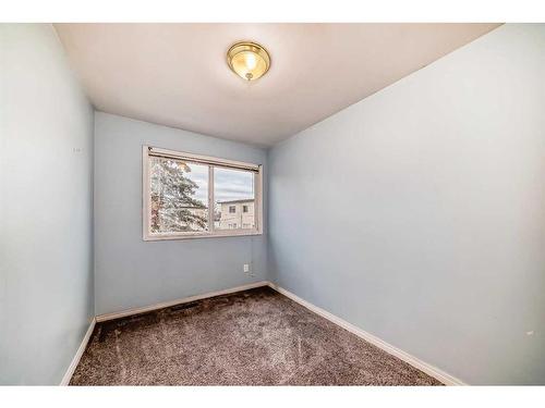 107-2211 19 Street Ne, Calgary, AB - Indoor Photo Showing Other Room