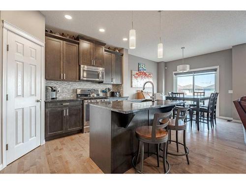 201 Hillcrest Drive Sw, Airdrie, AB - Indoor Photo Showing Kitchen With Upgraded Kitchen