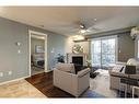 5211-279 Copperpond Common Se, Calgary, AB  - Indoor Photo Showing Living Room With Fireplace 