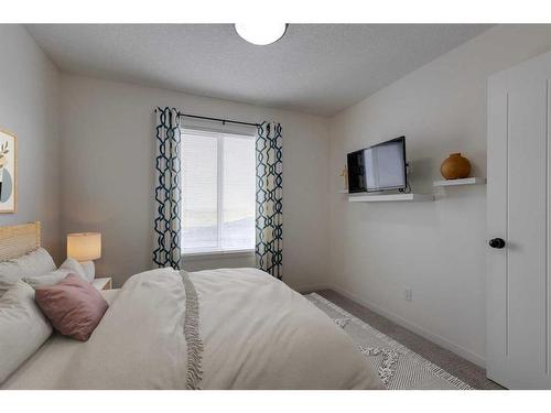 119 Marquis Green Se, Calgary, AB - Indoor Photo Showing Bedroom