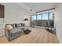 320-1087 2 Avenue Nw, Calgary, AB  - Indoor Photo Showing Living Room 