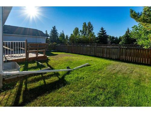 311 Carriage Lane Drive, Carstairs, AB - Outdoor With Backyard