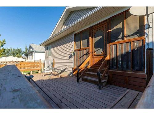 311 Carriage Lane Drive, Carstairs, AB - Outdoor With Deck Patio Veranda With Exterior