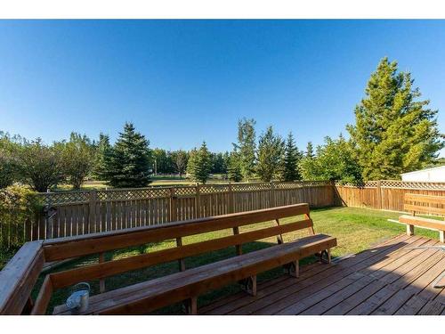 311 Carriage Lane Drive, Carstairs, AB - Outdoor With Deck Patio Veranda With Backyard