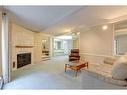 104-220 26 Avenue Sw, Calgary, AB  - Indoor Photo Showing Living Room With Fireplace 